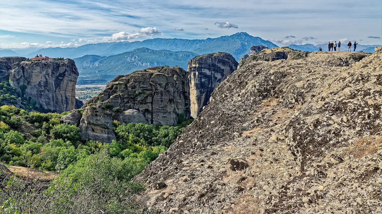 Monasteries perched on sandstone towers above the plain at Meteora in Greece