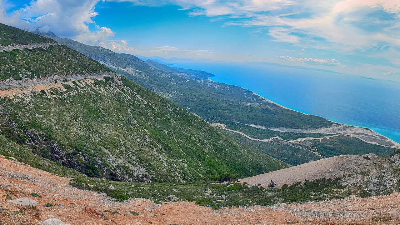 The Albanian Riviera unfolding below the Llogara Pass under clear late-summer light