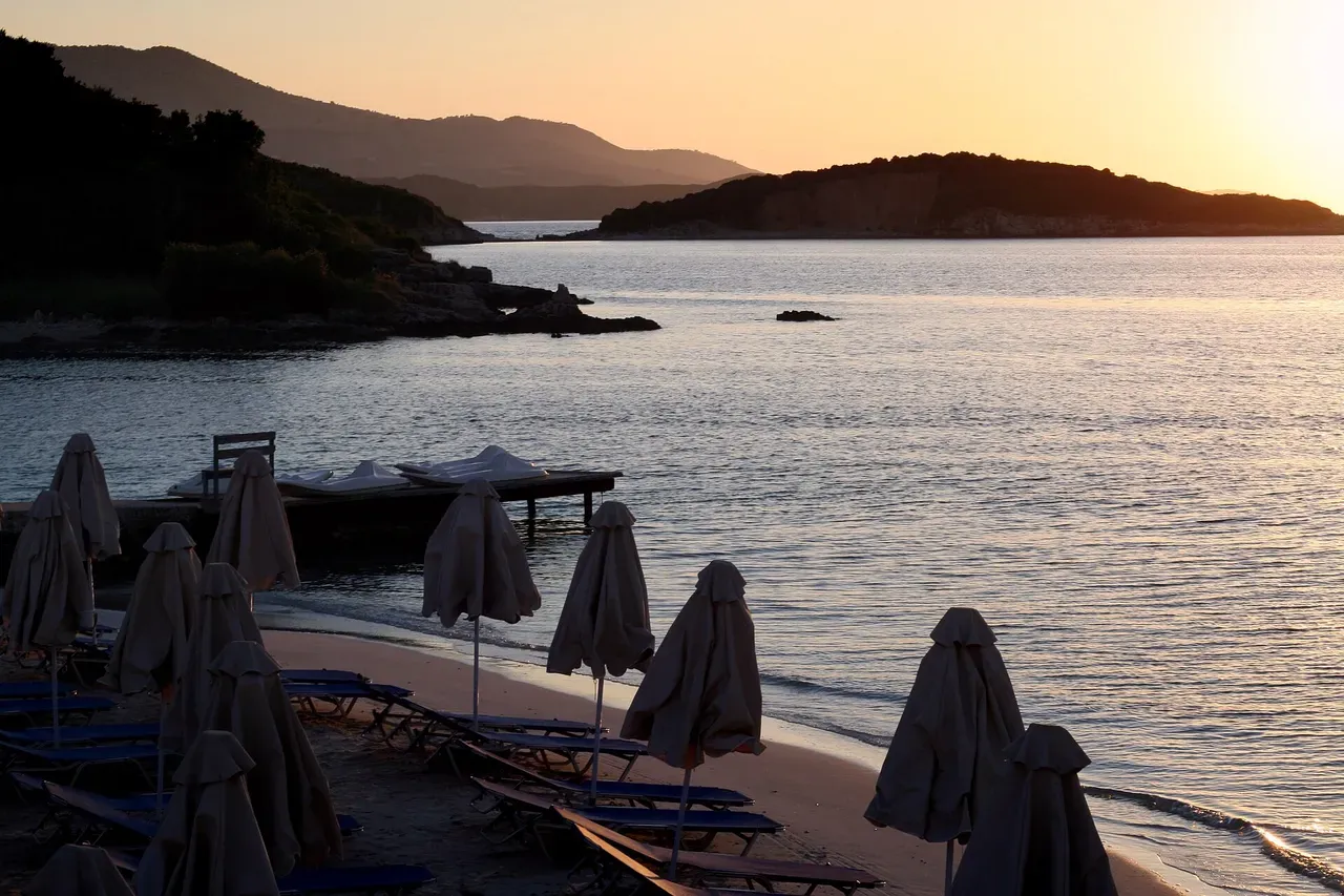 Clear shallow water and a rocky point at Ksamil on the southern Albanian coast