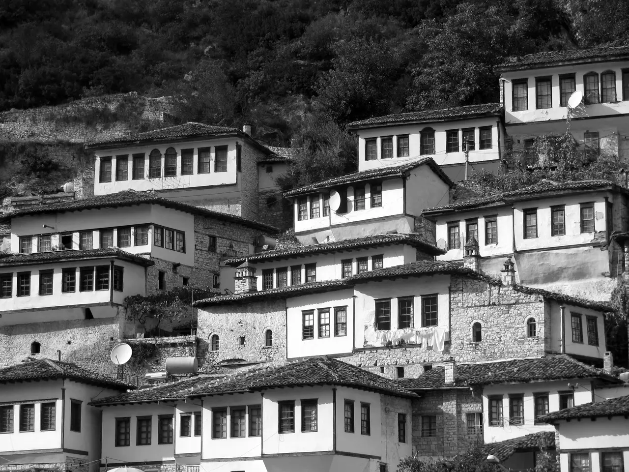 A cobbled lane in Berat old town lined with traditional Ottoman-era houses