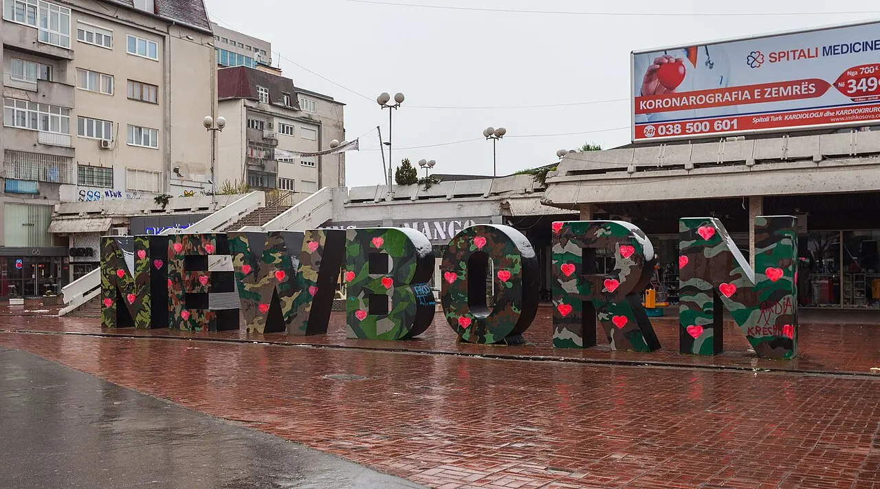 The camouflage-painted NEWBORN monument in central Pristina's main square
