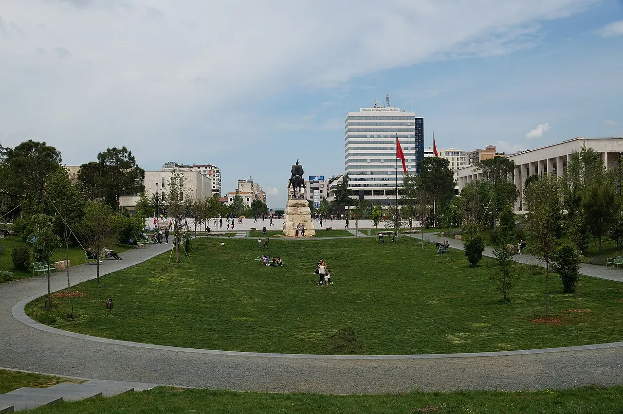 Skanderbeg Square in central Tirana in the evening with the surrounding buildings lit