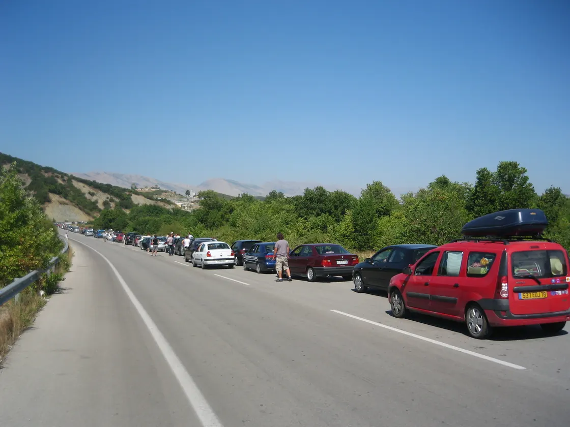A queue of cars waiting at the Kakavia border crossing between Albania and Greece