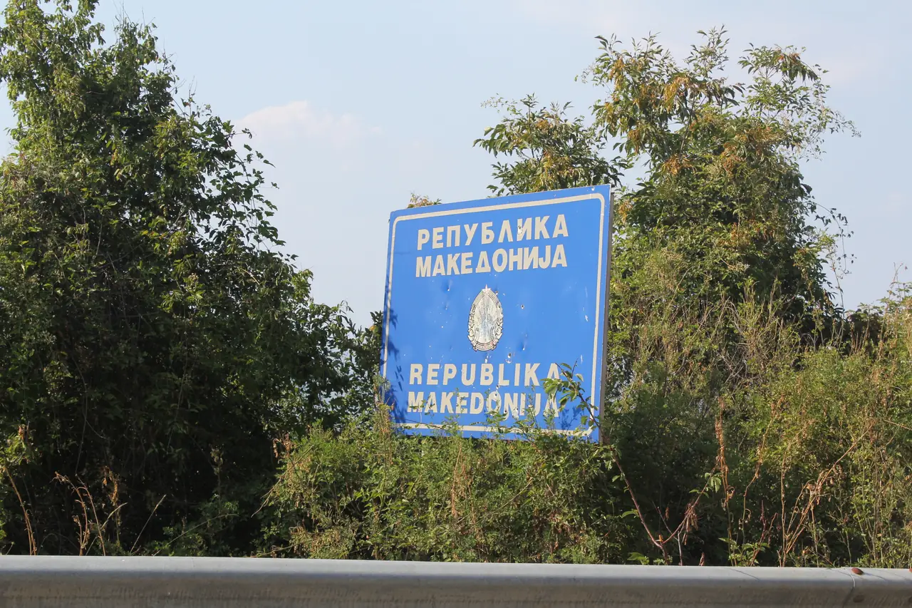 A roadside marker at the Albania-North Macedonia border crossing