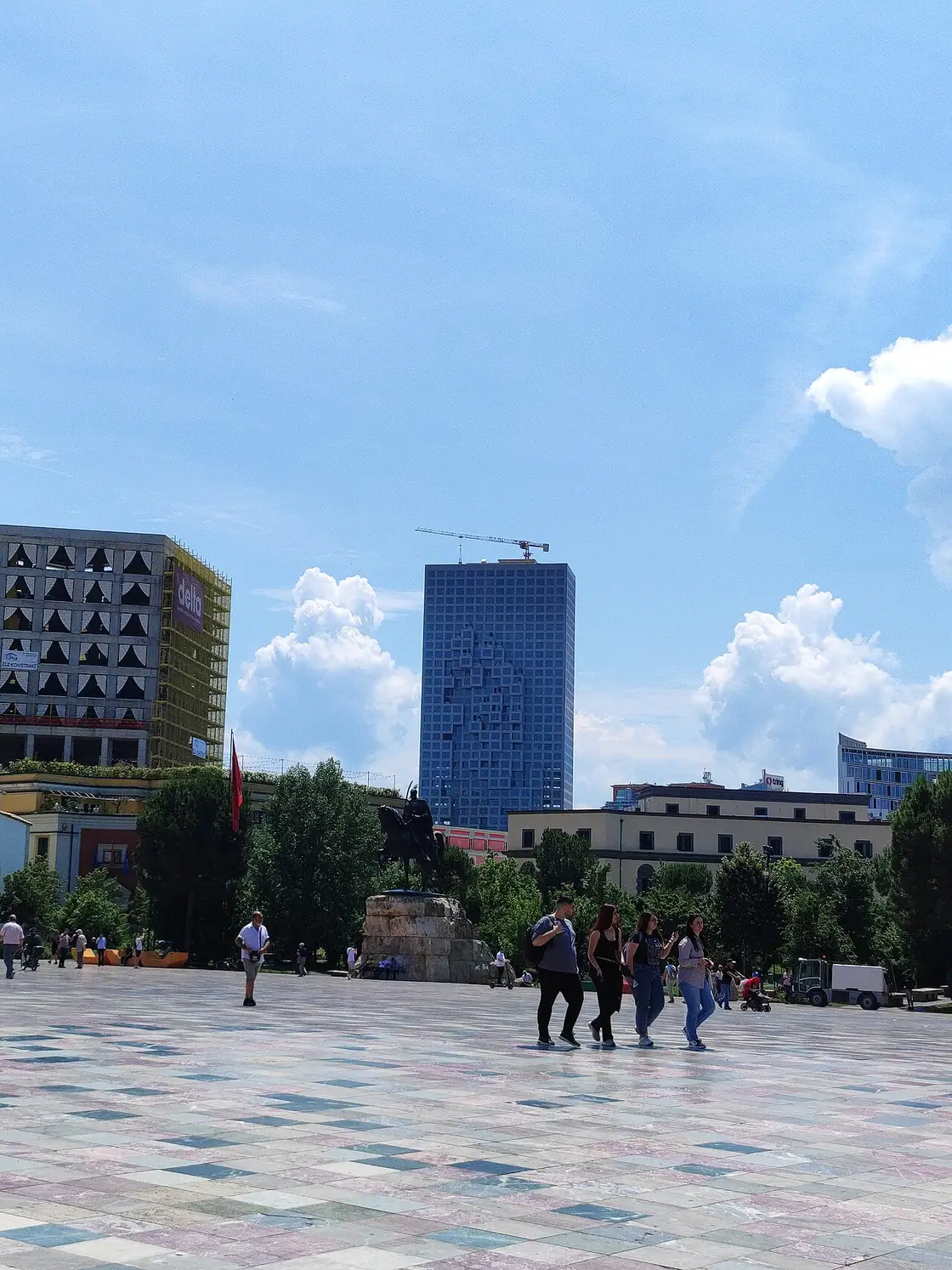 The redeveloped Pyramid of Tirana with Downtown One tower rising behind Skanderbeg Square
