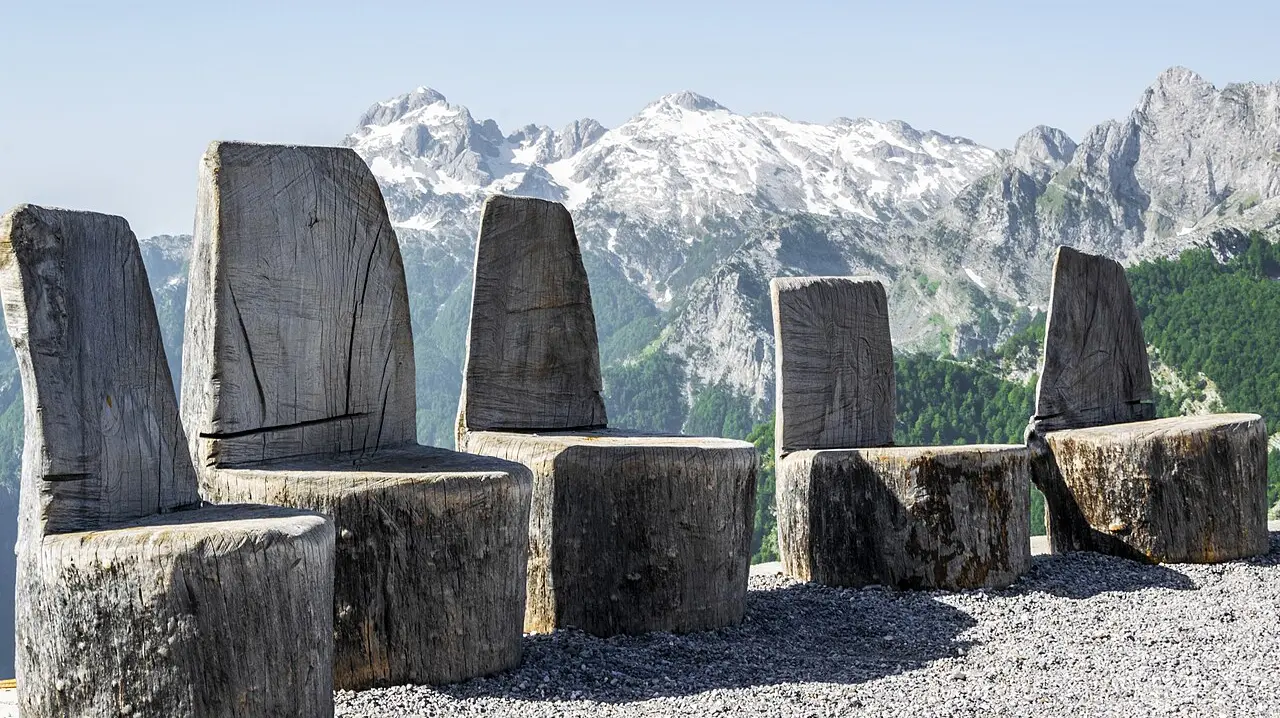 A wide view over the Albanian Alps from Theth, the kind of remote mountain terrain where travel insurance matters most