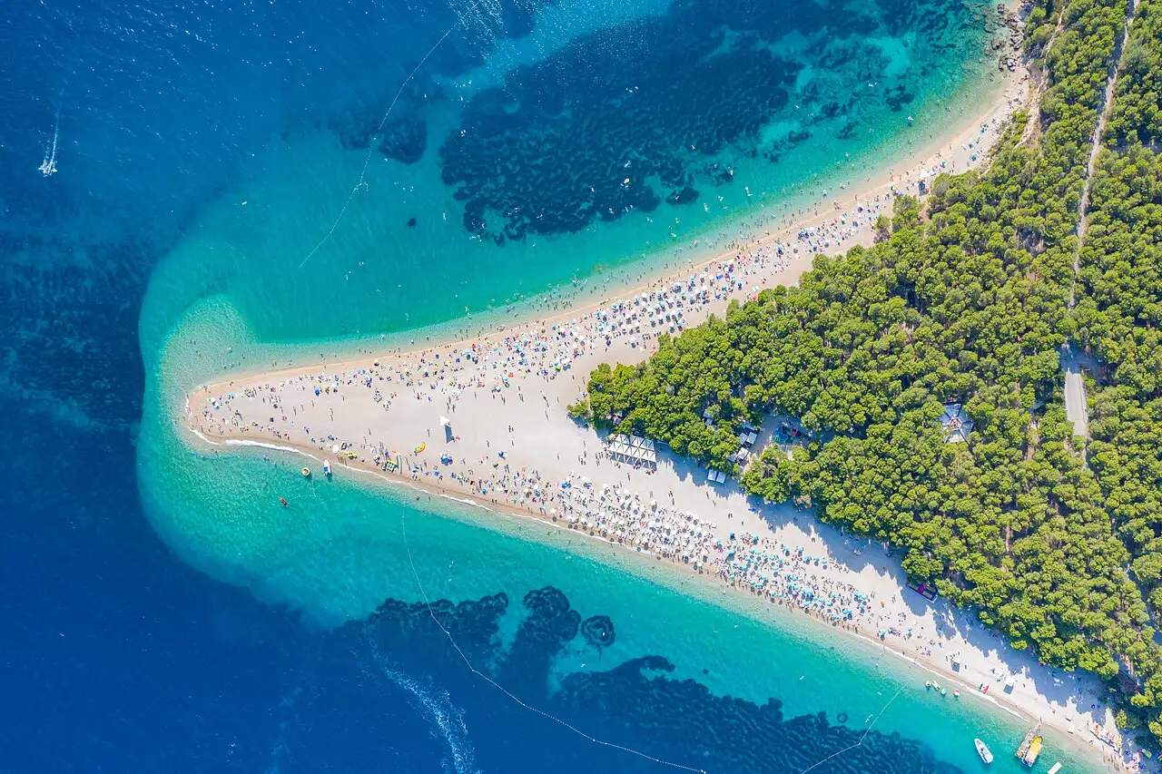 Aerial view of the Zlatni Rat Golden Horn pebble spit beach jutting into the sea at Bol on Brac island, Croatia