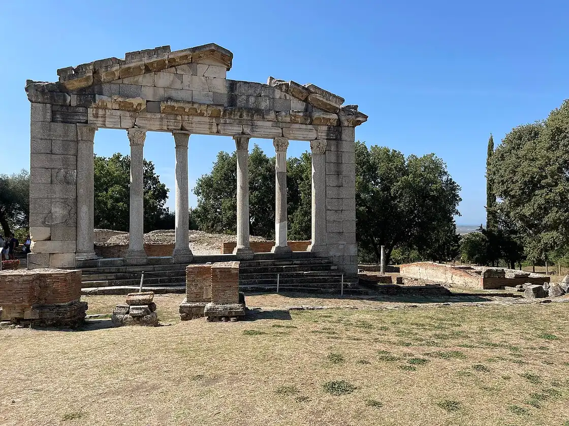 The Monument of Agonothetes at Apollonia in daylight, six columns supporting a carved pediment