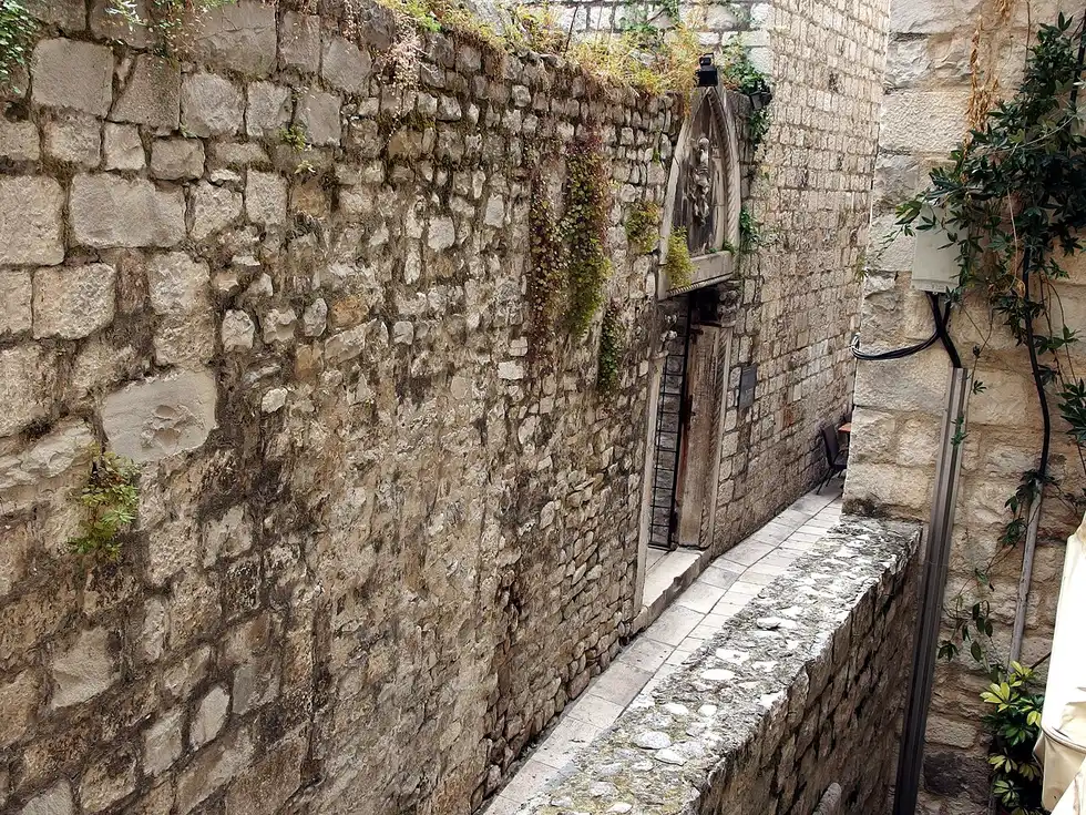 The stone courtyard and columns of Diocletian's Palace in the heart of Split old town