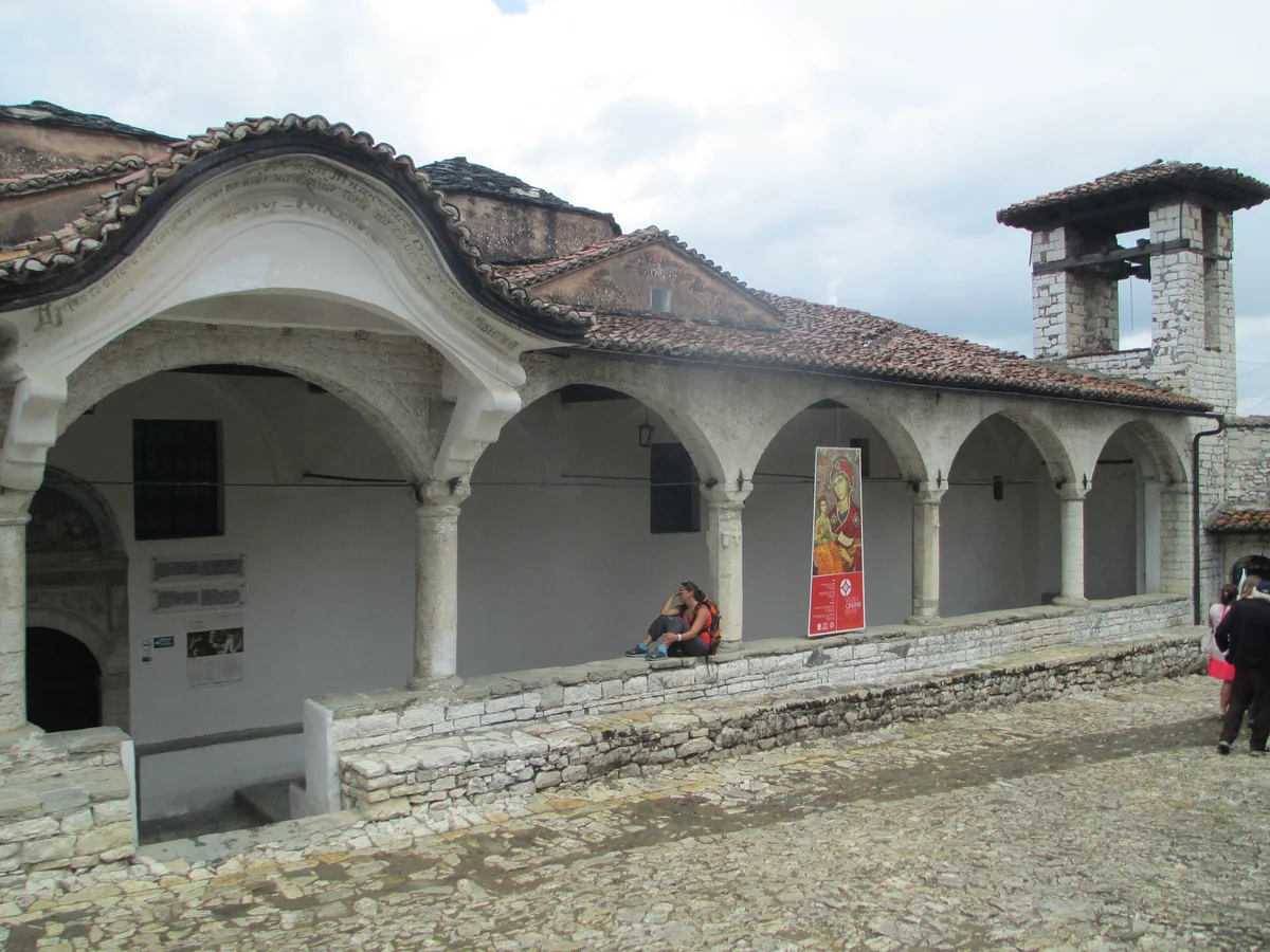 The arcaded portico and bell tower of the Dormition of St Mary church, home of the Onufri Museum, in Berat Castle
