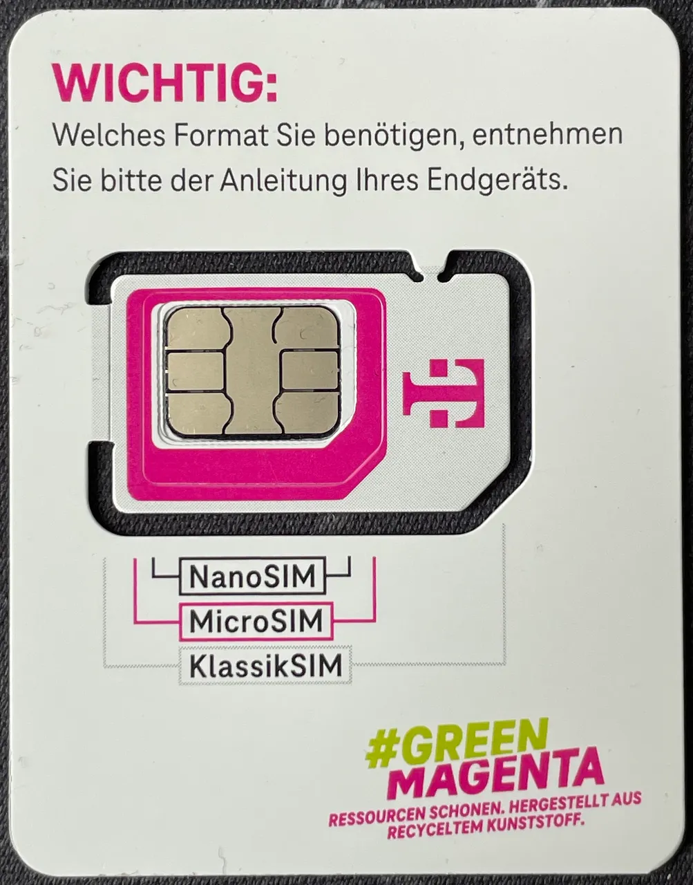 A multi-size SIM card in its plastic surround before an eSIM replaces it
