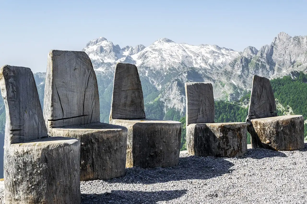 A view across the Albanian Alps near Theth, with steep peaks and a green valley