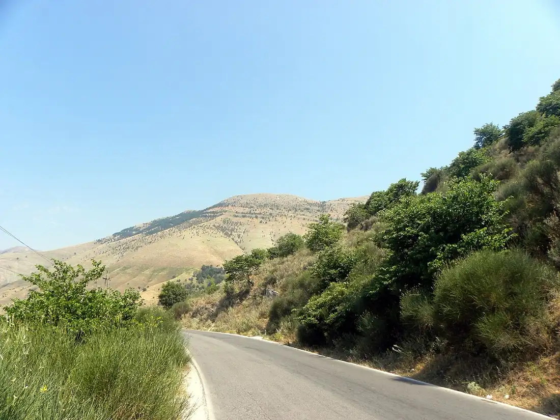 Winding road through hills on the way toward Gjirokaster