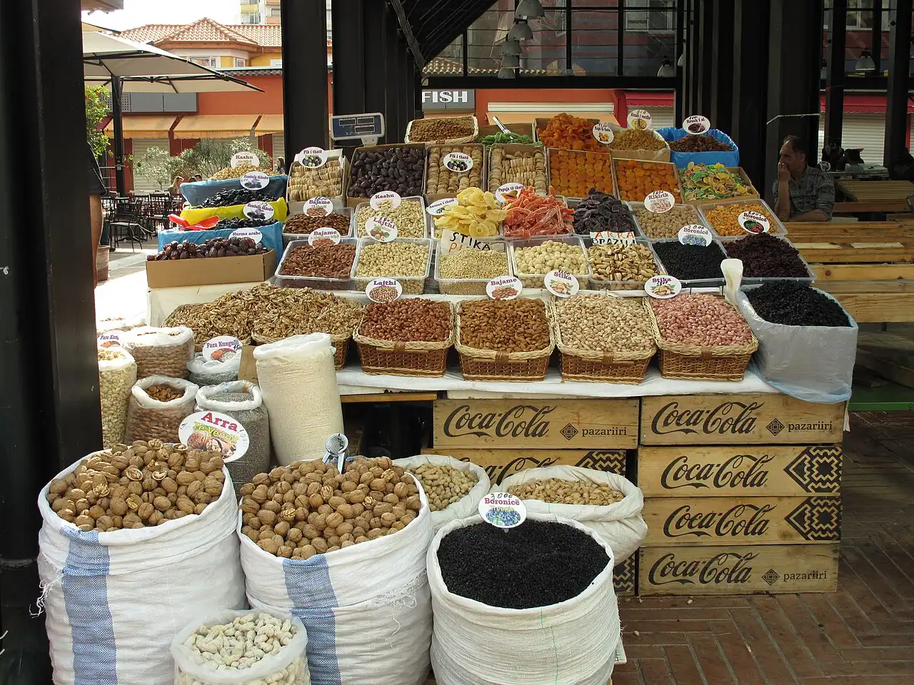 A colourful fruit, vegetable and dried-fruit stall at the New Bazaar in Tirana, the kind of place that takes only cash