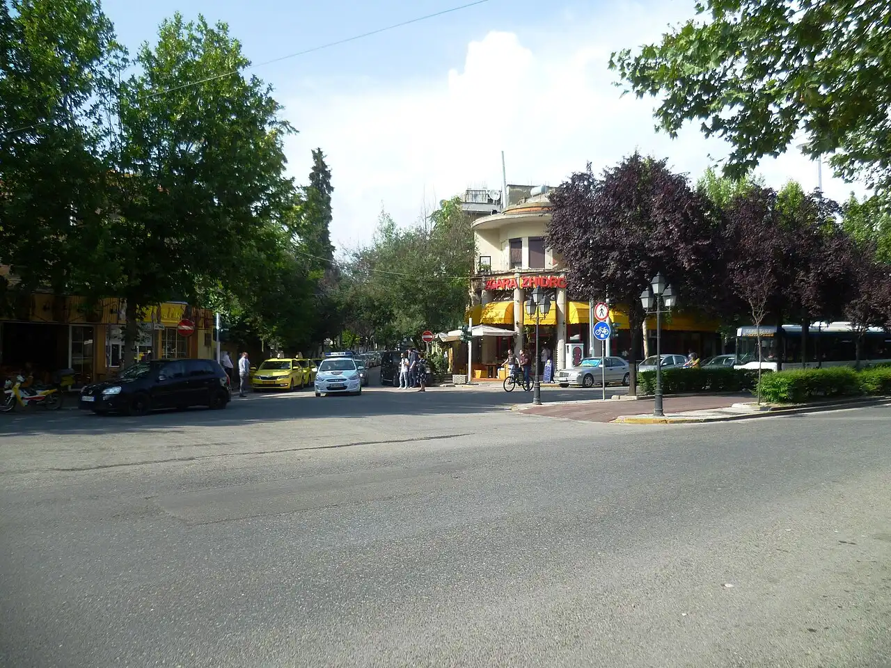 Shops, signs and pedestrians along Rruga e Kavajes, a busy commercial street in Tirana
