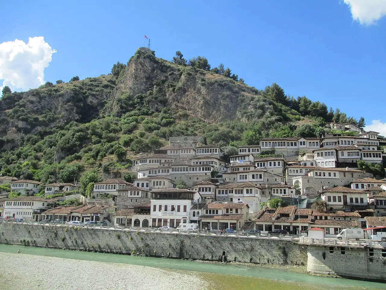 The stacked white Ottoman houses of the Mangalem quarter climbing the hillside in Berat