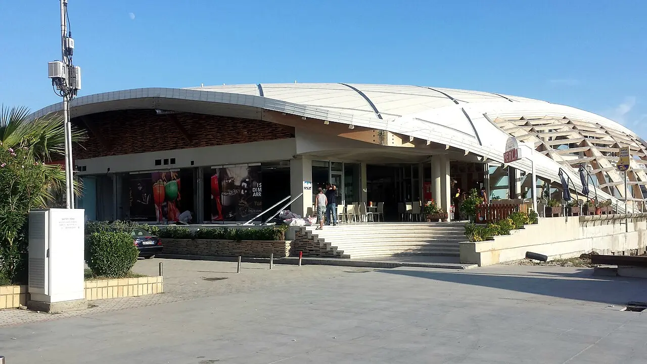 The wide palm-lined seafront promenade along the Durrës waterfront