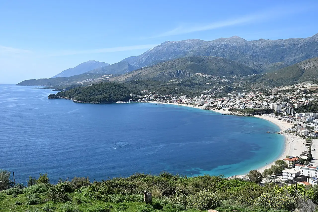 The town of Himara on the Albanian Riviera seen from the south, with its bay, harbour and the Ceraunian Mountains behind