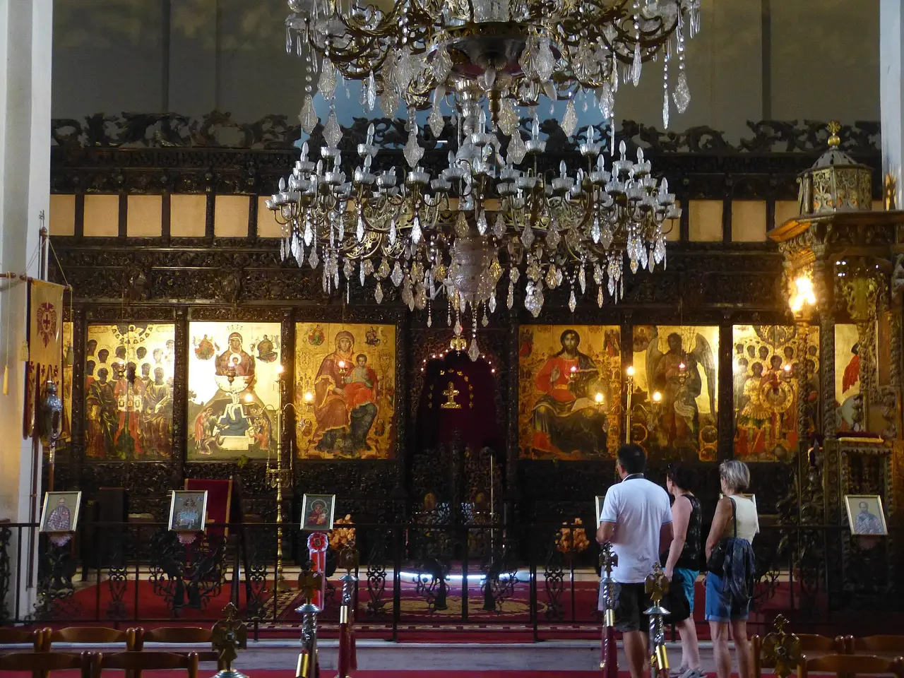 Carved wooden iconostasis displayed inside Korça's National Museum of Medieval Art