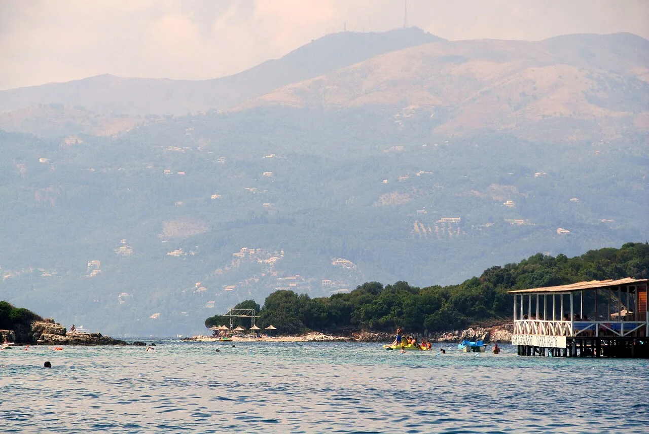 Small islets sitting just offshore from Ksamil in clear turquoise water