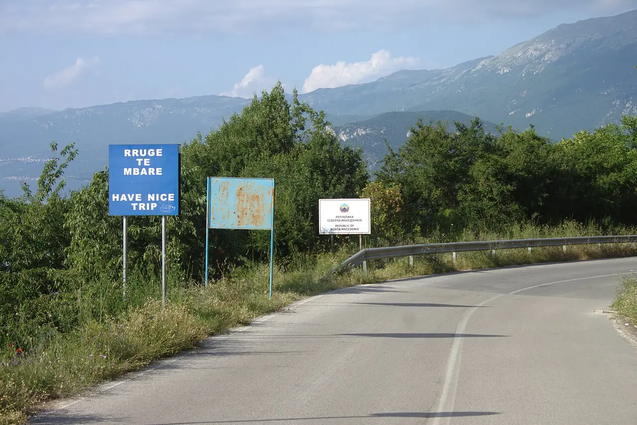 Road signage at the Tushemisht border crossing between Albania and North Macedonia