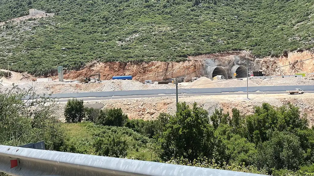 The portal of the Llogara Tunnel, which carries the coast road under the Llogara Pass