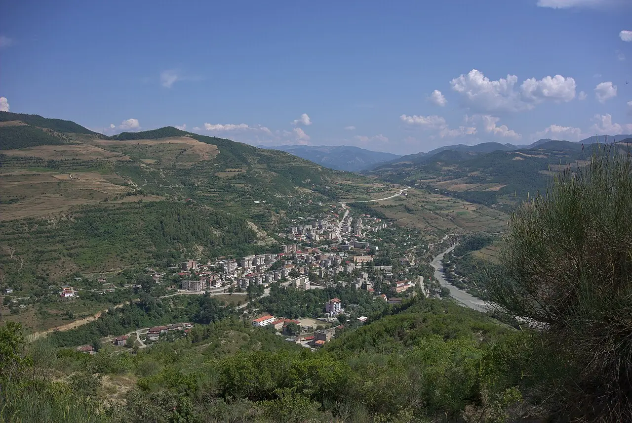The town of Corovode spread along the Osum valley with hills behind