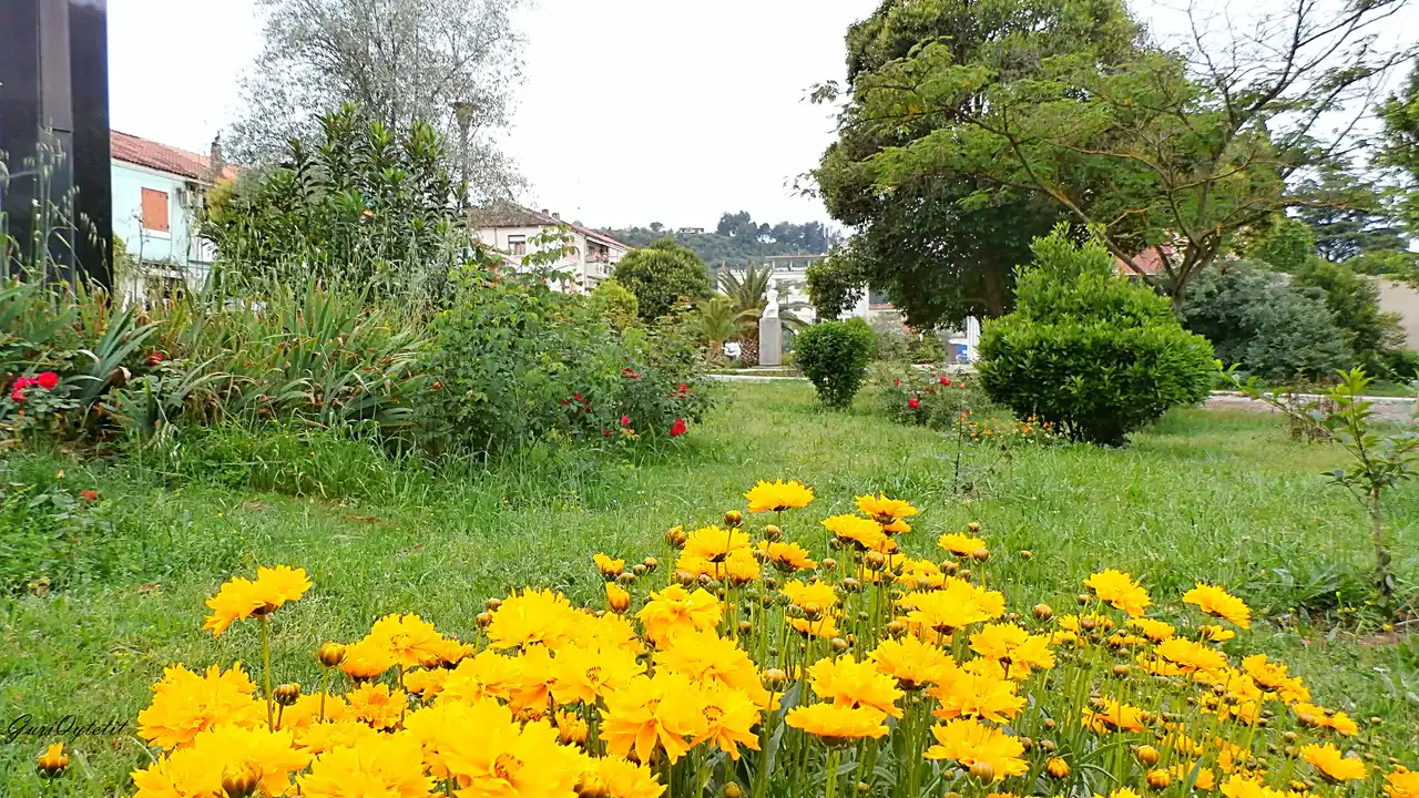 Flowerbeds in a Permet public garden in spring