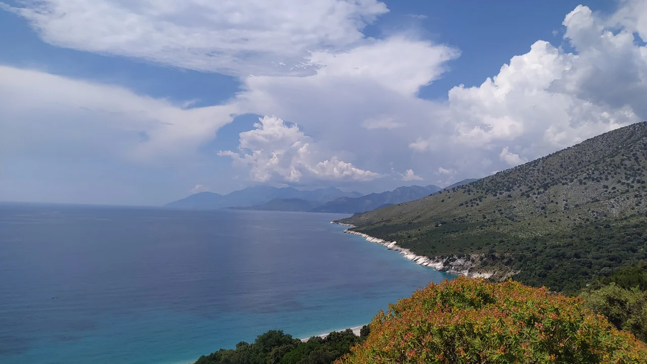 Turquoise water and a pebble cove at Krorez Beach on the Albanian Ionian coast