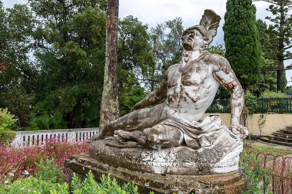 The Achilleion palace on Corfu with its gardens and statues above the Ionian Sea