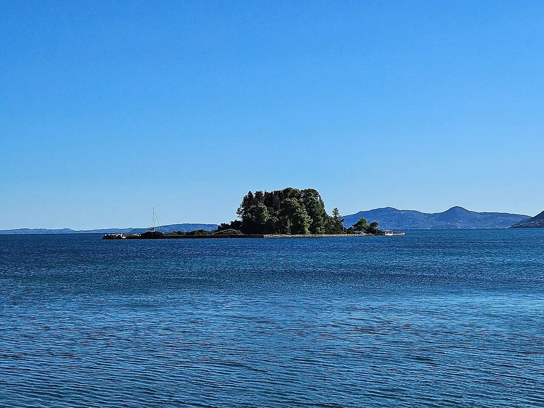 Pontikonisi (Mouse Island) with its chapel and cypress trees off the Kanoni peninsula in Corfu
