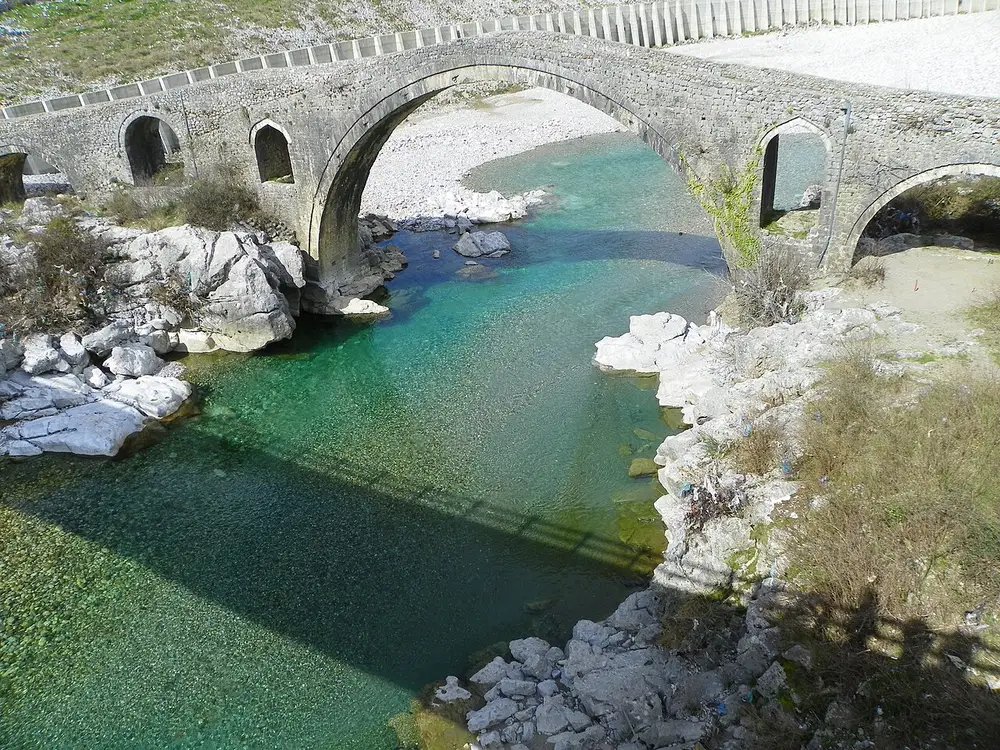 The long multi-arched Ottoman Mesi Bridge over the Kir river near Shkodra