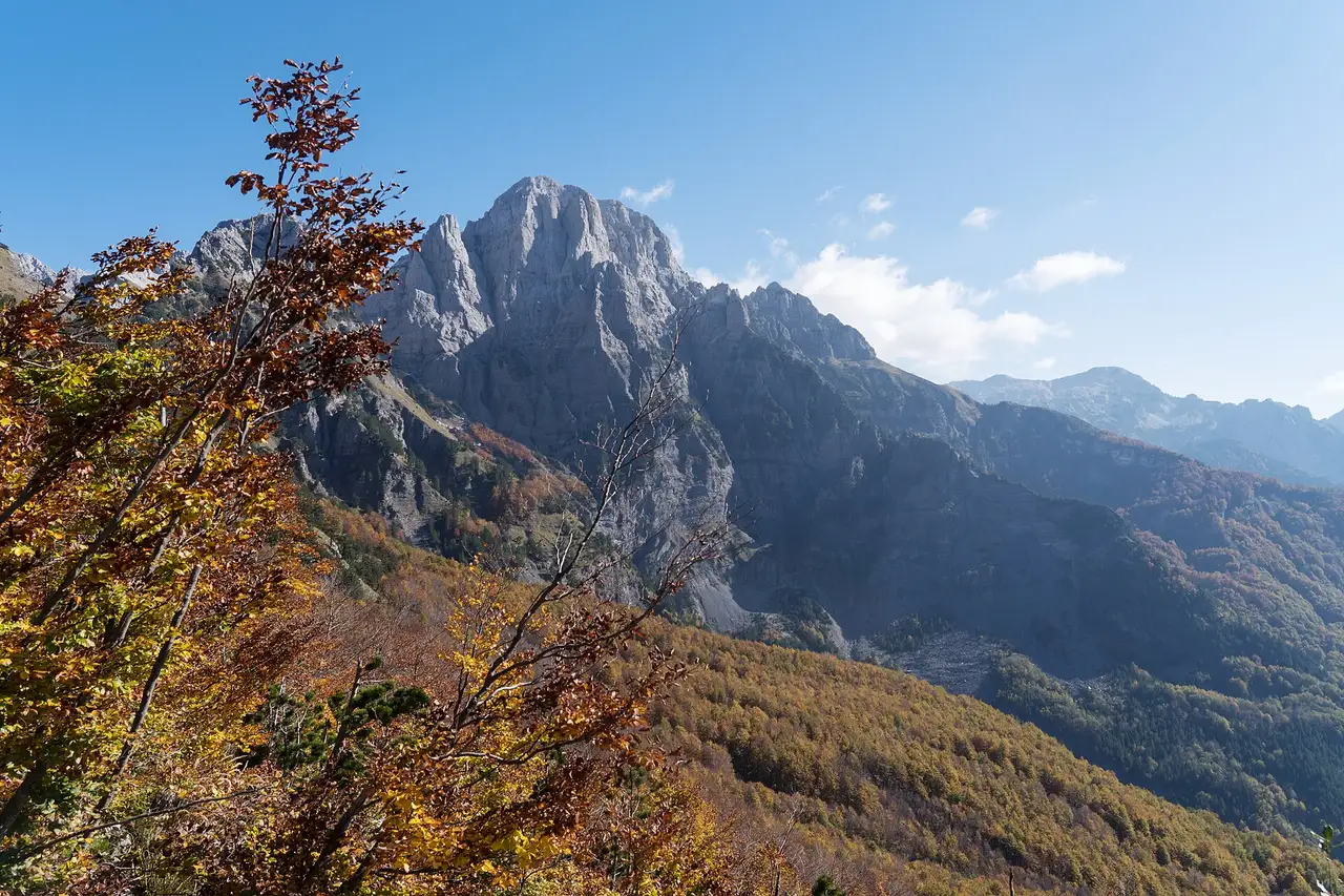 Autumn light on the jagged skyline of the Accursed Mountains above Theth