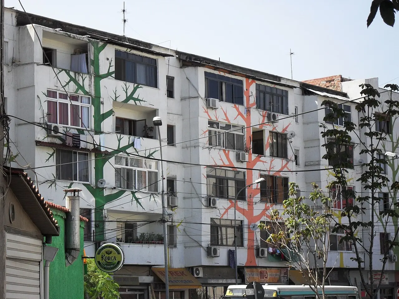 Painted facades of socialist-era apartment blocks in central Tirana