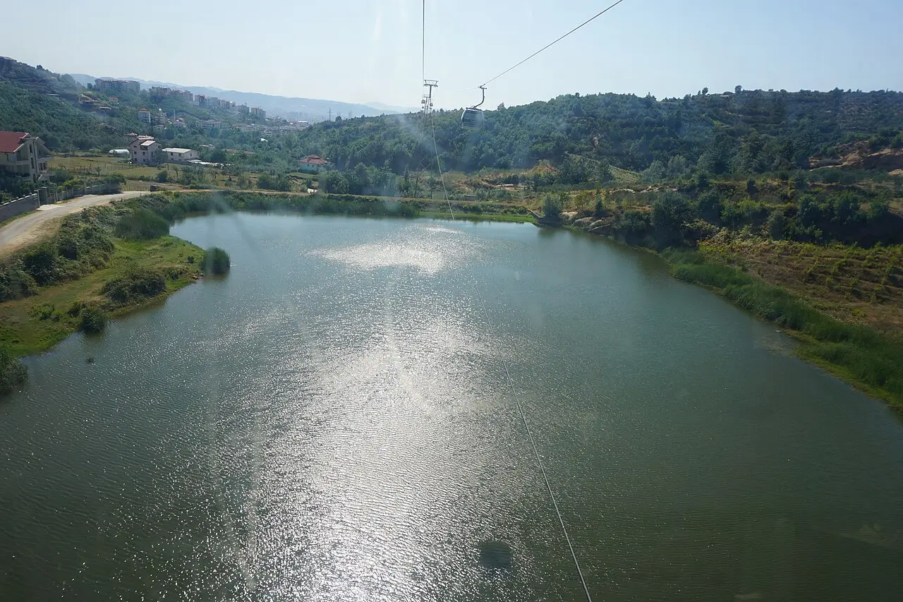 View over a wooded reservoir from the Dajti Ekspres cable car near Tirana