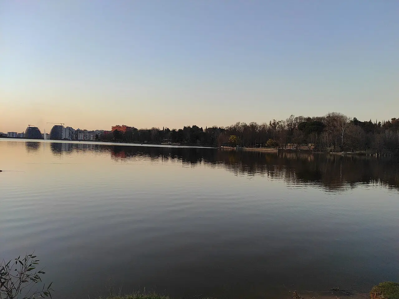 The artificial lake in the Grand Park of Tirana at sunset
