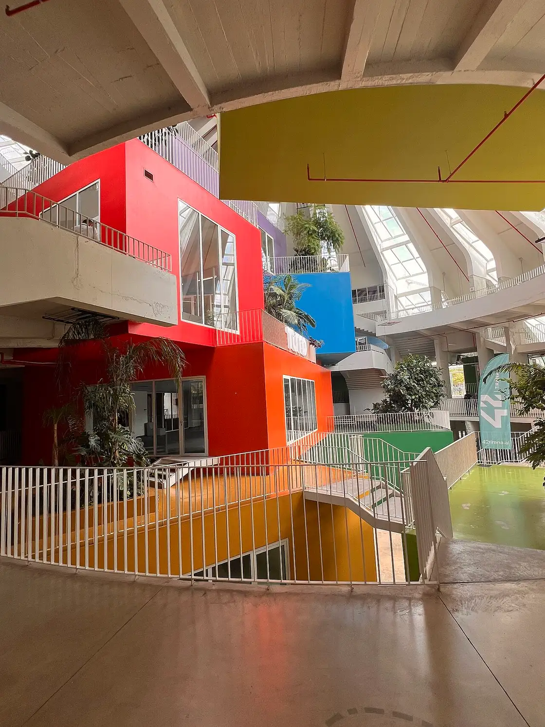 The bright colourful interior of the renovated Pyramid of Tirana