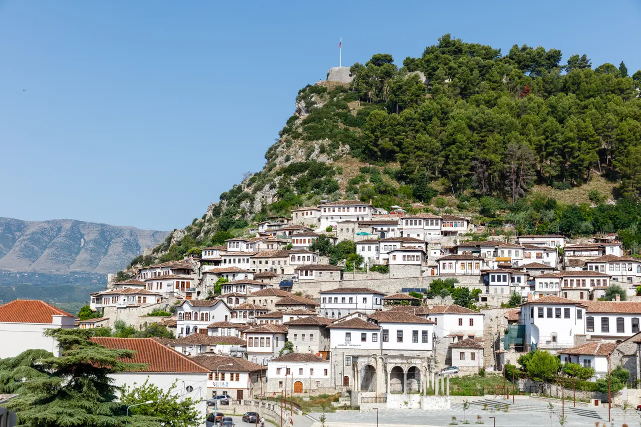 The Ottoman houses of the Mangalem quarter climbing the hillside below Berat Castle in central Albania