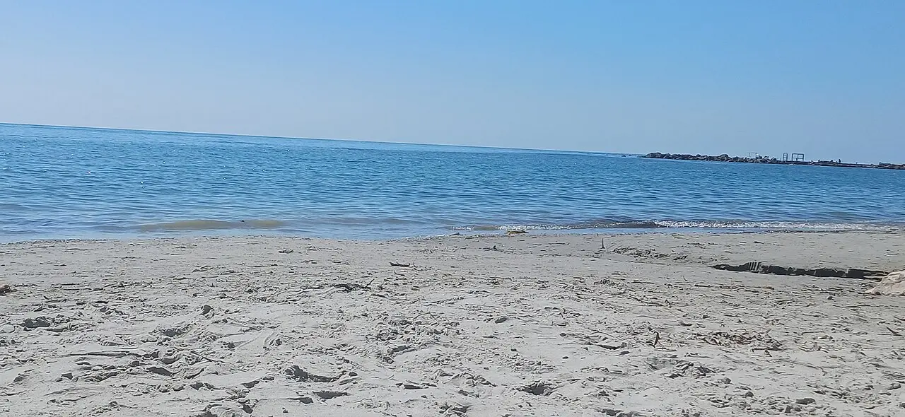 The clear blue water and sand of Currila beach north of Durres city centre in Albania