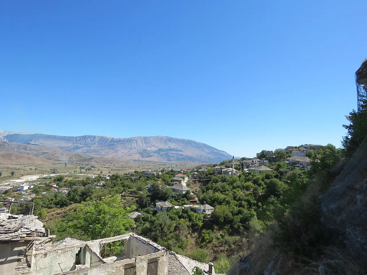 Wide view of the Drino valley farmland seen from the hills above Gjirokaster