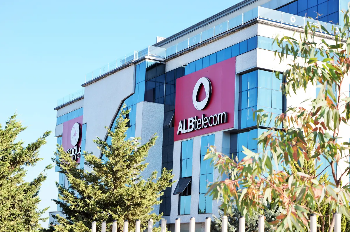 The glass and white headquarters building of ALBtelecom in Kashar near Tirana
